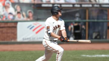 SAN FRANCISCO, CALIFORNIA - SEPTEMBER 27: Alex Dickerson #12 of the San Francisco Giants at bat against the San Diego Padres at Oracle Park on September 27, 2020 in San Francisco, California. (Photo by Lachlan Cunningham/Getty Images)