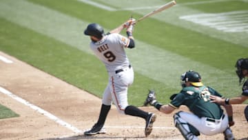 OAKLAND, CA - SEPTEMBER 20: Brandon Belt #9 of the San Francisco Giants bats during the game against the Oakland Athletics at RingCentral Coliseum on September 20, 2020 in Oakland, California. The Giants defeated the Athletics 14-2. (Photo by Michael Zagaris/Oakland Athletics/Getty Images)
