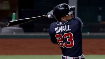 ARLINGTON, TEXAS - OCTOBER 12: Adam Duvall #23 of the Atlanta Braves injures himself while hitting a foul ball against the Los Angeles Dodgers during the second inning in Game One of the National League Championship Series at Globe Life Field on October 12, 2020 in Arlington, Texas. (Photo by Tom Pennington/Getty Images)