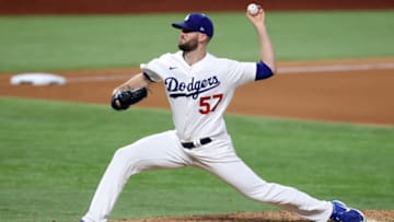 ARLINGTON, TEXAS - OCTOBER 21: Alex Wood #57 of the Los Angeles Dodgers delivers the pitch against the Tampa Bay Rays during the eighth inning in Game Two of the 2020 MLB World Series at Globe Life Field on October 21, 2020 in Arlington, Texas. (Photo by Tom Pennington/Getty Images)
