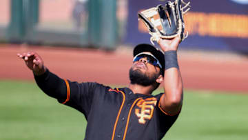 Heliot Ramos #80 of the SF Giants makes a catch during the sixth inning of a spring training game against the Chicago White Sox at Scottsdale Stadium on March 04, 2021 in Scottsdale, Arizona. (Photo by Carmen Mandato/Getty Images)