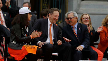 SF Giants owner Larry Baer and San Francisco Mayor Ed Lee talk during the Giants World Series victory parade on October 31, 2014 in San Francisco, California. (Photo by Jason O. Watson/Getty Images)