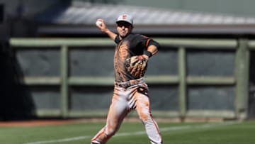 Chase d'Arnaud of the SF Giants fields a ground ball out during a spring training game. (Photo by Christian Petersen/Getty Images)