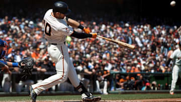 SAN FRANCISCO, CA - APRIL 29: Evan Longoria #10 of the San Francisco Giants hits a three-run home run off of Kenta Maeda (not pictured) of the Los Angeles Dodgers during the first inning at AT&T Park on April 29, 2018 in San Francisco, California. (Photo by Jason O. Watson/Getty Images)