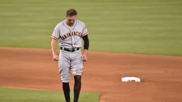MIAMI, FL - JUNE 12: Hunter Pence #8 of the San Francisco Giants walks back towards the dugout at the end of the eighth inning of the game against the Miami Marlins at Marlins Park on June 12, 2018 in Miami, Florida. (Photo by Eric Espada/Getty Images)
