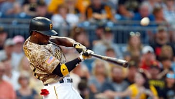 PITTSBURGH, PA - AUGUST 03: Andrew McCutchen #22 of the Pittsburgh Pirates hits an RBI single in the third inning against the Cincinnati Reds at PNC Park on August 3, 2017 in Pittsburgh, Pennsylvania. (Photo by Justin K. Aller/Getty Images)