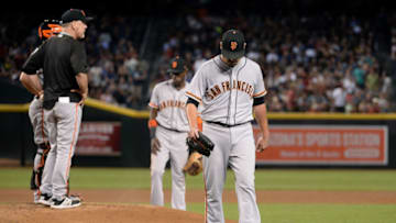PHOENIX, AZ - SEPTEMBER 26: Matt Moore #45 of the San Francisco Giants is relieved by Bruce Bochy #15 in the second inning of the MLB game against the Arizona Diamondbacks at Chase Field on September 26, 2017 in Phoenix, Arizona. (Photo by Jennifer Stewart/Getty Images)