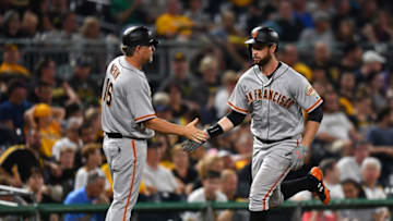 PITTSBURGH, PA - JUNE 30: Brandon Belt #9 celebrates his solo home run with Phil Nevin #16 of the San Francisco Giants during the eighth inning against the Pittsburgh Pirates at PNC Park on June 30, 2017 in Pittsburgh, Pennsylvania. (Photo by Joe Sargent/Getty Images)