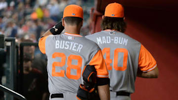 PHOENIX, AZ - AUGUST 26: Buster Posey #28 and Madison Bumgarner #40 of the San Francisco Giants wearing nickname-bearing jerseys prepare for the game against the Arizona Diamondbacks at Chase Field on August 26, 2017 in Phoenix, Arizona. (Photo by Jennifer Stewart/Getty Images)