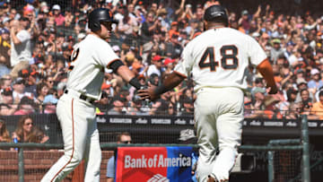 SAN FRANCISCO, CA - SEPTEMBER 30: Pablo Sandoval #48 of the San Francisco Giants is congratulated by Joe Panik #12 after Sandoval scored against the San Diego Padres in the bottom of the second inning at AT&T Park on September 30, 2017 in San Francisco, California. (Photo by Thearon W. Henderson/Getty Images)