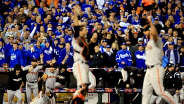 KANSAS CITY, MO - OCTOBER 29: Buster Posey #28 , Madison Bumgarner #40, Pablo Sandoval #48 and the San Francisco Giants celebrate after defeating the Kansas City Royals to win Game Seven of the 2014 World Series by a score of 3-2 at Kauffman Stadium on October 29, 2014 in Kansas City, Missouri. (Photo by Jamie Squire/Getty Images)