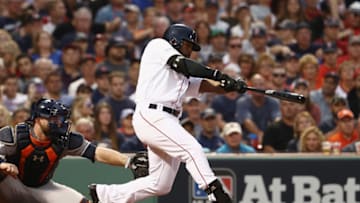 BOSTON, MA - OCTOBER 08: Jackie Bradley Jr. #19 of the Boston Red Sox hits a three-run home run in the seventh inning against the Houston Astros during game three of the American League Division Series at Fenway Park on October 8, 2017 in Boston, Massachusetts. (Photo by Maddie Meyer/Getty Images)