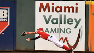 CINCINNATI, OH - AUGUST 23: Billy Hamilton #6 of the Cincinnati Reds makes a diving catch in center field of a fly ball off the leadoff hitter of the Texas Rangers in the sixth inning at Great American Ball Park on August 23, 2016 in Cincinnati, Ohio. Cincinnati defeated Texas 3-0. (Photo by Jamie Sabau/Getty Images)