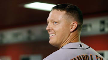 PHOENIX, AZ - SEPTEMBER 25: Nick Hundley #5 of the San Francisco Giants looks out toward the field from the dugout after hitting a three-run home run against the Arizona Diamondbacks during the fourth inning of a MLB game at Chase Field on September 25, 2017 in Phoenix, Arizona. The Giants defeated the Diamondbacks 9-2. (Photo by Ralph Freso/Getty Images)