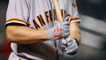 PHOENIX, AZ - SEPTEMBER 25: Buster Posey #28 of the San Francisco Giants stands in the on-deck circle wearing Franklin batting gloves during a MLB game against the Arizona Diamondbacks at Chase Field on September 25, 2017 in Phoenix, Arizona. The Giants defeated the Diamondbacks 9-2. (Photo by Ralph Freso/Getty Images)