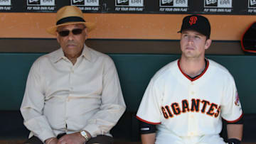 SAN FRANCISCO, CA - SEPTEMBER 08: San Francisco Giants great Orlando Cepeda (left) sits next to Buster Posey