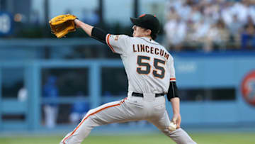 LOS ANGELES, CA - SEPTEMBER 14: Tim Lincecum #55 of the San Francisco Giants throws a pitch against the Los Angeles Dodgers at Dodger Stadium on September 14, 2013 in Los Angeles, California. (Photo by Stephen Dunn/Getty Images)