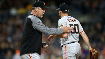 SAN DIEGO, CA - APRIL 13: Manager Bruce Bochy takes Ty Blach