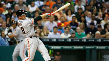 HOUSTON, TX - MAY 13: Buster Posey #28 of the San Francisco Giants belts a two-run home run in the fifth inning of their game against the Houston Astros at Minute Maid Park on May 13, 2015 in Houston, Texas. (Photo by Scott Halleran/Getty Images)