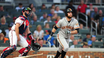 ATLANTA, GA - MAY 4: Brandon Belt #9 of the San Francisco Giants hits an RBI double in the second inning against the Atlanta Braves at SunTrust Park on May 4, 2018 in Atlanta, Georgia. (Photo by Scott Cunningham/Getty Images)