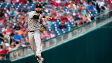 WASHINGTON, DC - JUNE 10: Brandon Crawford #35 of the San Francisco Giants makes the throw to first to retire Anthony Rendon #6 of the Washington Nationals (not pictured) during the ninth inning at Nationals Park on June 10, 2018 in Washington, DC. (Photo by Scott Taetsch/Getty Images)