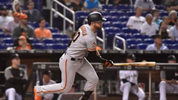 MIAMI, FL - JUNE 11: Evan Longoria #10 of the San Francisco Giants hits an RBI single in the third inning against the Miami Marlins at Marlins Park on June 11, 2018 in Miami, Florida. (Photo by Eric Espada/Getty Images)