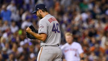 DENVER, CO - JULY 2: Madison Bumgarner #40 of the San Francisco Giants reacts after being relieved with the bases loaded in the seventh inning of a game against the Colorado Rockies at Coors Field on July 2, 2018 in Denver, Colorado. (Photo by Dustin Bradford/Getty Images)