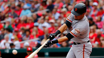 ST. LOUIS, MO - SEPTEMBER 22: Joe Panik #12 of the San Francisco Giants hits an RBI single against the St. Louis Cardinals in the third inning at Busch Stadium on September 22, 2018 in St. Louis, Missouri. (Photo by Dilip Vishwanat/Getty Images)