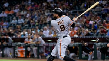 PHOENIX, ARIZONA - AUGUST 15: Brandon Belt #9 of the San Francisco Giants hits an RBI double in the sixth inning of the MLB game against the Arizona Diamondbacks at Chase Field on August 15, 2019 in Phoenix, Arizona. (Photo by Jennifer Stewart/Getty Images)