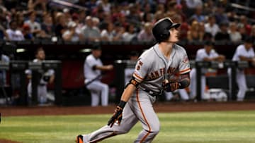 PHOENIX, ARIZONA - AUGUST 16: Mike Yastrzemski #5 of the San Francisco Giants hits a solo home run during the third inning against the Arizona Diamondbacks at Chase Field on August 16, 2019 in Phoenix, Arizona. (Photo by Norm Hall/Getty Images)