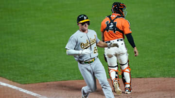 SAN FRANCISCO, CALIFORNIA - AUGUST 14: Matt Chapman #26 of the Oakland Athletics scores the go-ahead run against the San Francisco Giants in the top of the 10th inning at Oracle Park on August 14, 2020 in San Francisco, California. The Athletics won the game 8-7 in 10 innings. (Photo by Thearon W. Henderson/Getty Images)