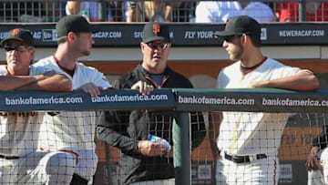 SAN FRANCISCO, CA - SEPTEMBER 03: Madison Bumgarner #40 of the San Francisco Giants and Brandon Belt #9 of the San Francisco Giants talk to Will Clark during a game against the Arizona Diamondbacks at AT&T Park on September 3, 2012 in San Francisco, California. (Photo by Tony Medina/Getty Images)