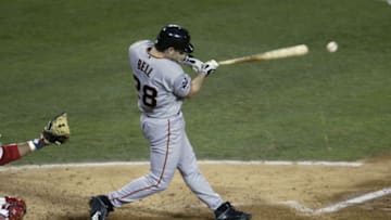 ANAHEIM, CA - OCTOBER 19: Third Baseman David Bell #28 of the San Francisco Giants connects with the ball during game one of the World Series against the Anaheim Angels on October 19, 2002 at Edison Field in Anaheim, California. The Giants defeated the Angels 4-3. (Photo by Jed Jacobsohn/Getty Images)
