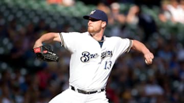 MILWAUKEE, WI - SEPTEMBER 20: Will Smith #13 of the Milwaukee Brewers throws in the seven inning of play aganist the Cincinnati Reds at Miller Park on September 20, 2015 in Milwaukee, Wisconsin. (Photo by Tasos Katopodis/Getty Images)