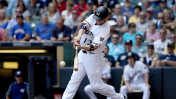 MILWAUKEE, WI - AUGUST 30: Stephen Vogt #12 of the Milwaukee Brewers hits a single in the second inning against the St. Louis Cardinals at Miller Park on August 30, 2017 in Milwaukee, Wisconsin. (Photo by Dylan Buell/Getty Images)