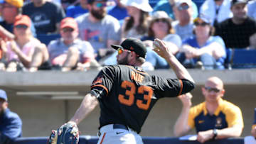 Darin Ruf of the SF Giants throws the ball to first base. (Photo by Norm Hall/Getty Images)