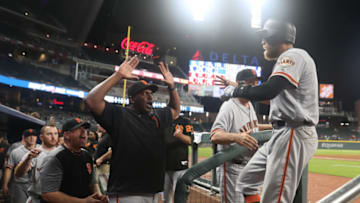 SF Giants right fielder Hunter Pence (8) celebrates his solo home run with then Giants hitting coach Hensley Meulens (31, center). (Jason Getz-USA TODAY Sports)