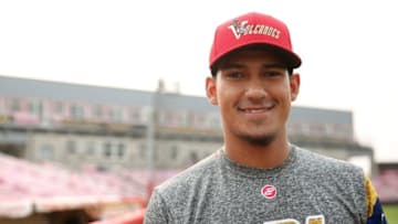Catching prospect Ricardo Genoves with the Salem-Keizer Volcanoes. (Volcbase Superstitions Ar 09)