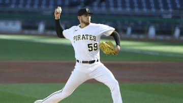 Sep 20, 2020; Pittsburgh, Pennsylvania, USA; Pittsburgh Pirates starting pitcher Joe Musgrove (59) delivers a pitch against the St. Louis Cardinals during the third inning at PNC Park. Mandatory Credit: Charles LeClaire-USA TODAY Sports