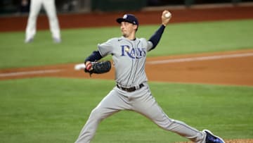 Oct 21, 2020; Arlington, Texas, USA; Tampa Bay Rays starting pitcher Blake Snell (4) delivers a pitch in the 5th inning against the Los Angeles Dodgers in game two of the 2020 World Series at Globe Life Field. Mandatory Credit: Tim Heitman-USA TODAY Sports
