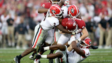 PASADENA, CA - JANUARY 01: Roquan Smith #3, Lorenzo Carter #7 and Aaron Davis #35 of the Georgia Bulldogs sack Baker Mayfield #6 of the Oklahoma Sooners during the 2018 College Football Playoff Semifinal Game at the Rose Bowl Game presented by Northwestern Mutual at the Rose Bowl on January 1, 2018 in Pasadena, California. (Photo by Matthew Stockman/Getty Images)