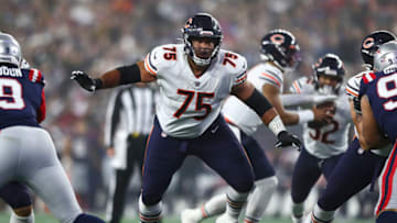 FOXBOROUGH, MA - OCTOBER 24: Larry Borom #75 of the Chicago Bears blocks during an NFL football game against the New England Patriots at Gillette Stadium on October 24, 2022 in Foxborough, Massachusetts. (Photo by Kevin Sabitus/Getty Images)