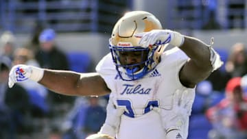 Nov 10, 2018; Memphis, TN, USA; Tulsa Golden Hurricane offensive tackle Willie Wright (58) and running back Corey Taylor II (24) celebrate during the second half against the Memphis Tigers at Liberty Bowl Memorial Stadium. Memphis defeated Tulsa 47-27. Mandatory Credit: Justin Ford-USA TODAY Sports