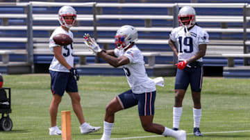 Jun 10, 2021; Foxborough, MA, USA; New England Patriots wide receiver NÕkeal Harry (15) participates in drills during OTAs at the New England Patriots practice complex. Mandatory Credit: Paul Rutherford-USA TODAY Sports