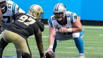 Sep 19, 2021; Charlotte, North Carolina, USA; New Orleans Saints defensive end Malcolm Roach (97) goes up against Carolina Panthers center Matt Paradis (61)during the second half at Bank of America Stadium. Mandatory Credit: Jim Dedmon-USA TODAY Sports