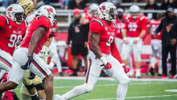 Ball State's Christian Albright celebrates after stopping a run by Army during their game at Scheumann Stadium Saturday, Oct. 2, 2021.