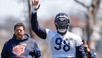 May 7, 2022; Lake Forest, IL, USA; Chicago Bears defensive tackle Micah Dew-Treadway (98) stretches during team's rookie minicamp at Halas Hall. Mandatory Credit: Kamil Krzaczynski-USA TODAY Sports