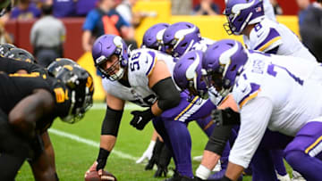 Nov 6, 2022; Landover, Maryland, USA; Minnesota Vikings center Garrett Bradbury (56) prepares to snap the ball against the Washington Commanders during the first half at FedExField. Mandatory Credit: Brad Mills-USA TODAY Sports