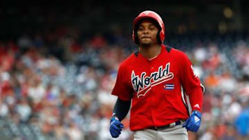 WASHINGTON, D.C. - JULY 15: Yusniel Diaz #17 of the World Team rounds the bases after hitting a home run during the SiriusXM All-Star Futures Game at Nationals Park on July 15, 2018 in Washington, DC. (Photo by Patrick McDermott/Getty Images)