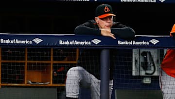 NEW YORK, NY - SEPTEMBER 21: Buck Showalter #26 of the Baltimore Orioles looks on from th ebench during th egame against the New York Yankees at Yankee Stadium on September 21, 2018 in the Bronx borough of New York City. (Photo by Mike Stobe/Getty Images)